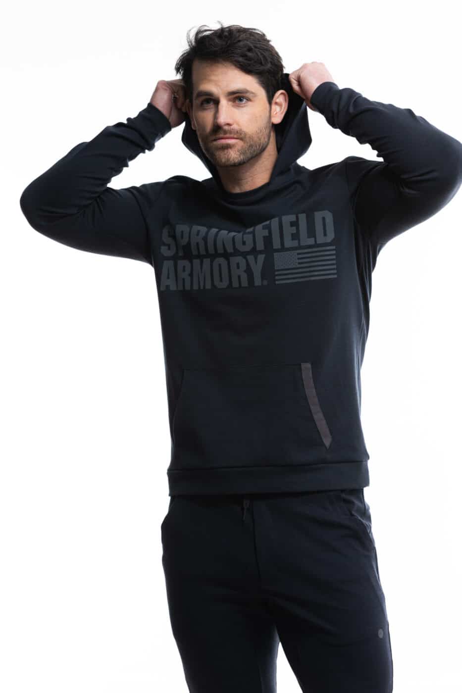 Man modeling Premium Hoodie from the Alexo Athletica x Springfield Armory collection