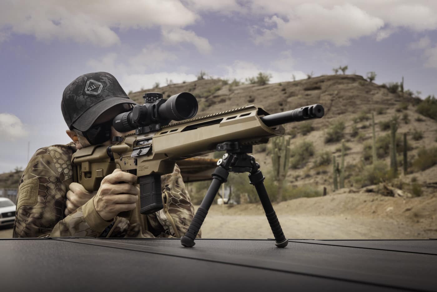 Man testing the Springfield Armory SAINT Edge ATC rifle with B5 Systems stock on the range