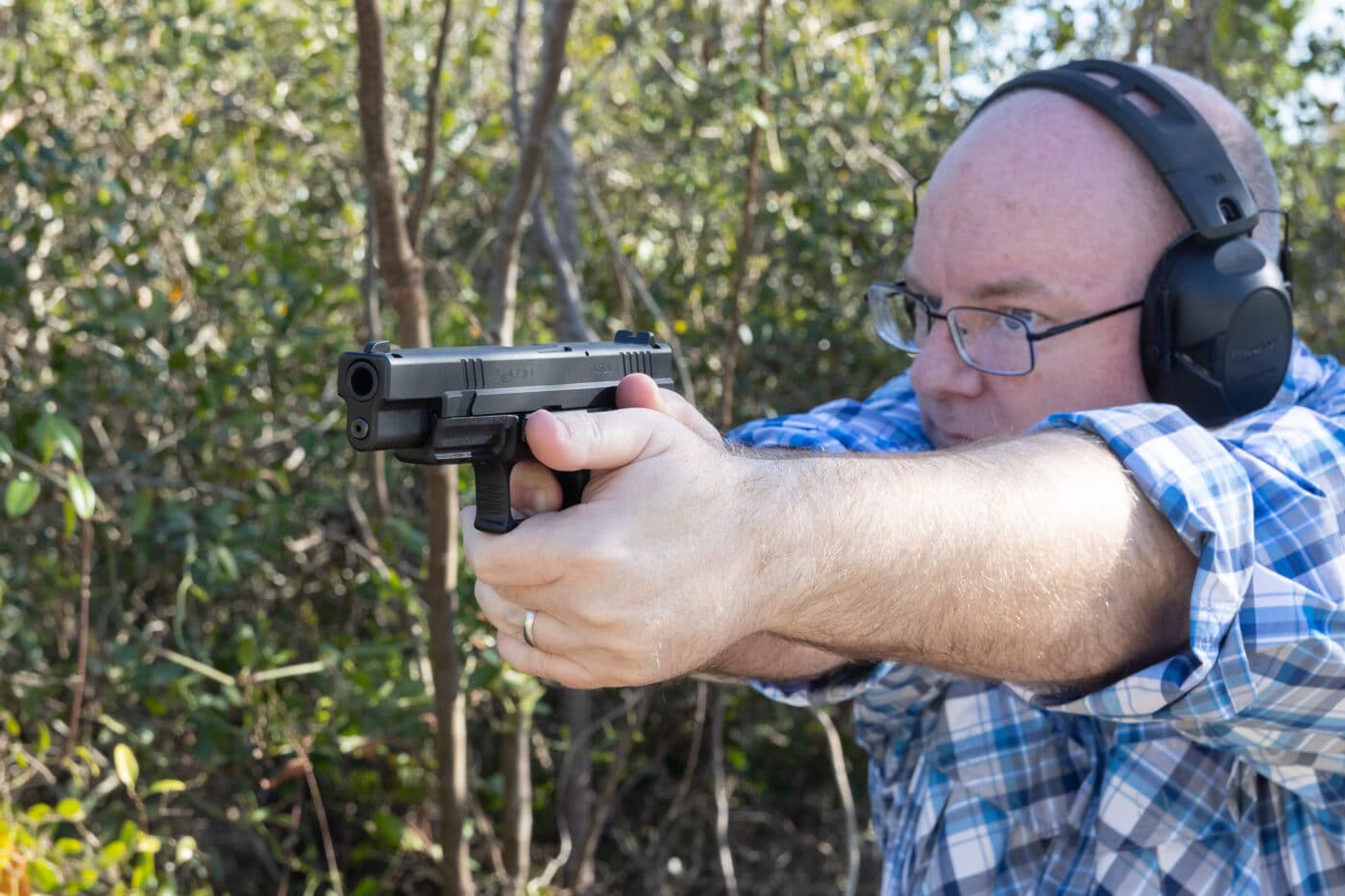 Author shooting the Springfield XD40 Tactical pistol being reviewed