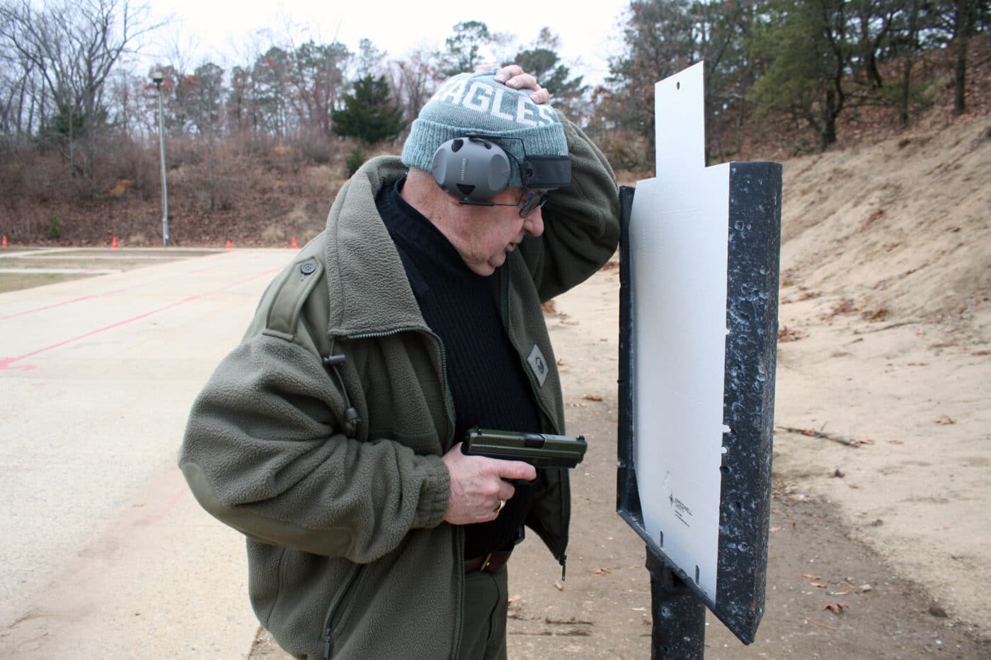 Man practicing close range shooting