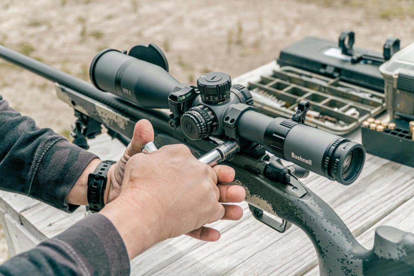 Man showing proper torque of Badger Ordnance scope ring