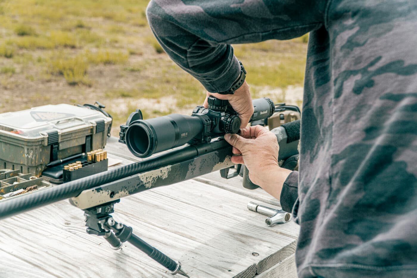 Man installing a scope on a Waypoint rifle