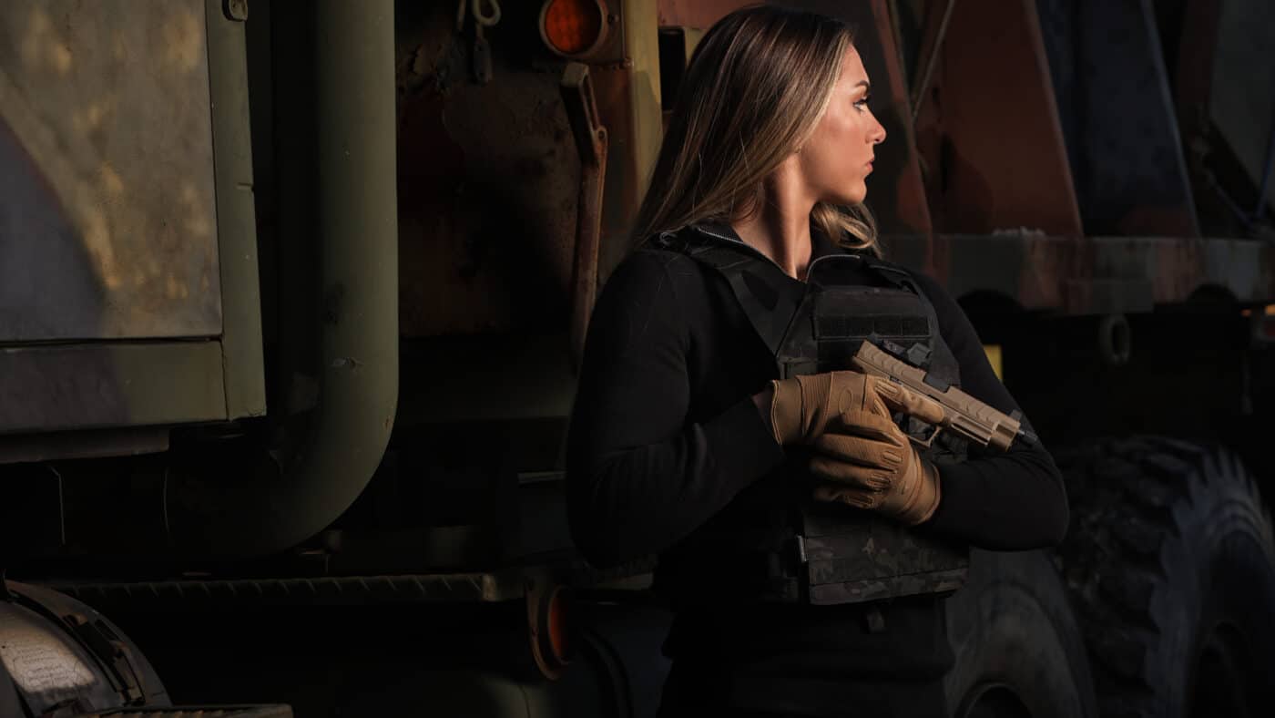 Woman holding Springfield Armory pistol
