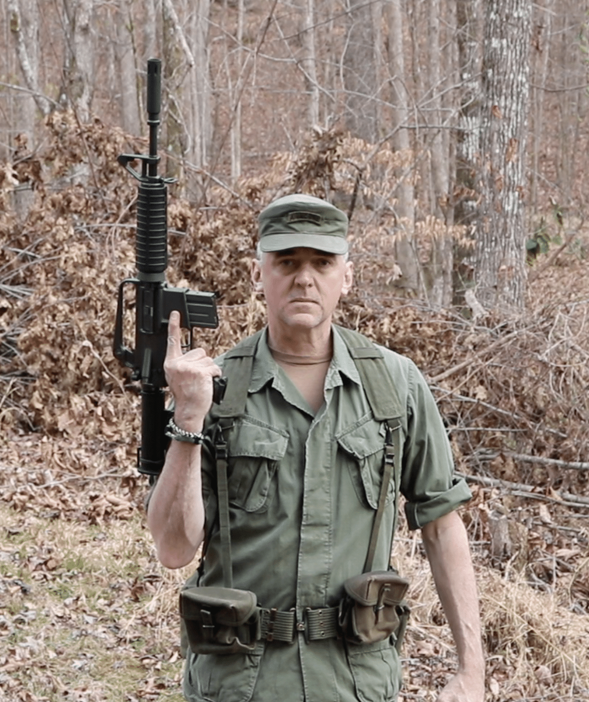 Man wearing M-1956 Individual Load Carrying Equipment