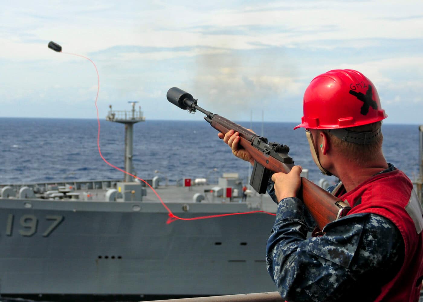 M14 firing a line to a US Navy ship