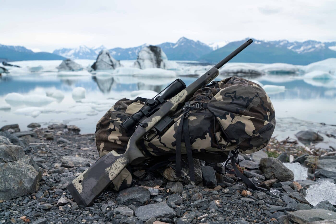 Springfield Armory Model 2020 Waypoint rifle resting on a backpack in the Alaskan wilderness