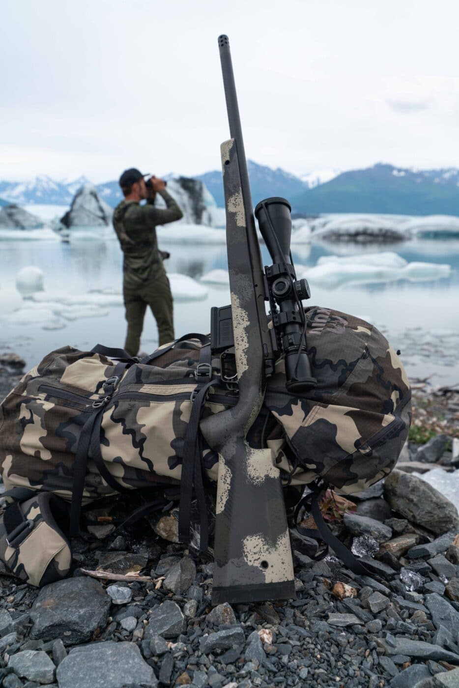 Man testing the Model 2020 Waypoint rifle in Alaska