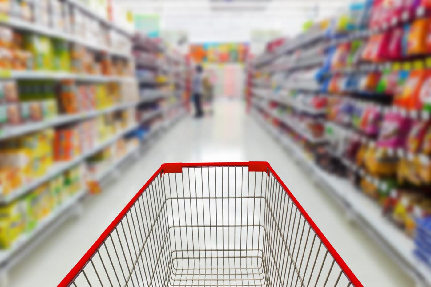 Shopping cart in a store aisle while shopping for food