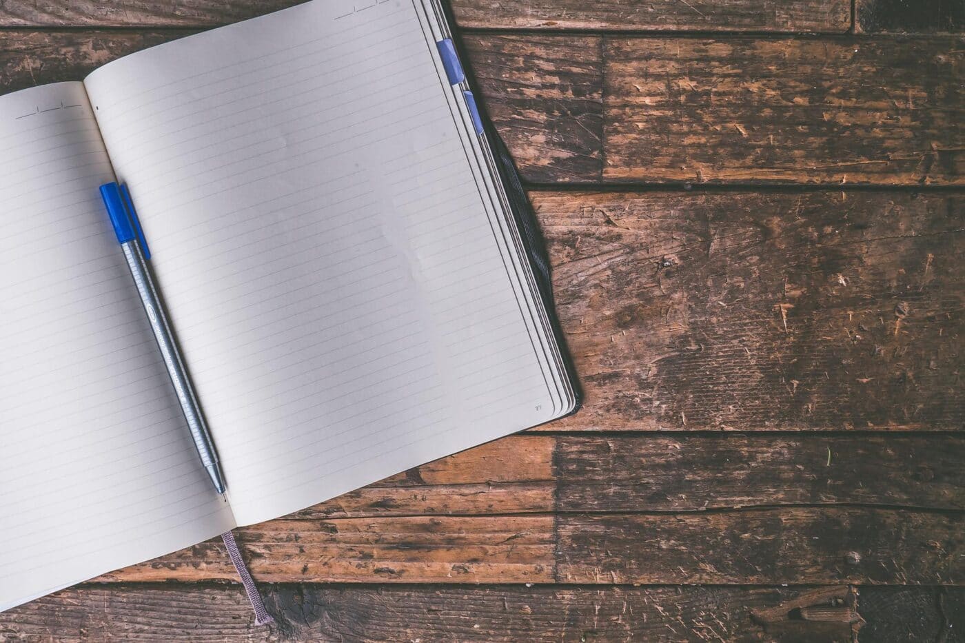 Notebook and pen on a table