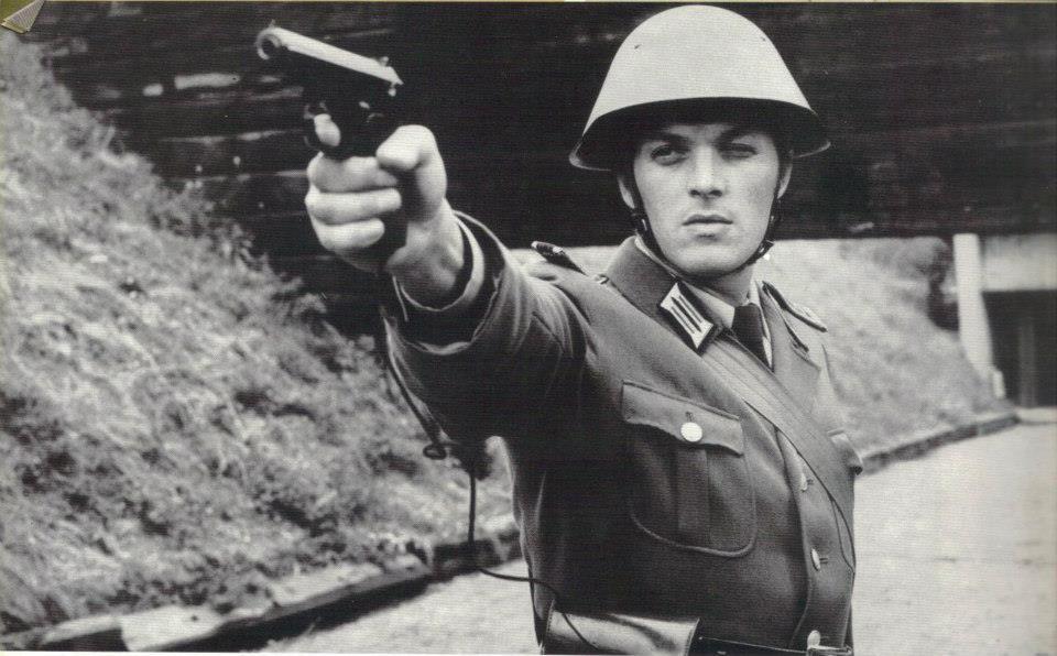 East German soldier holding a Makarov pistol
