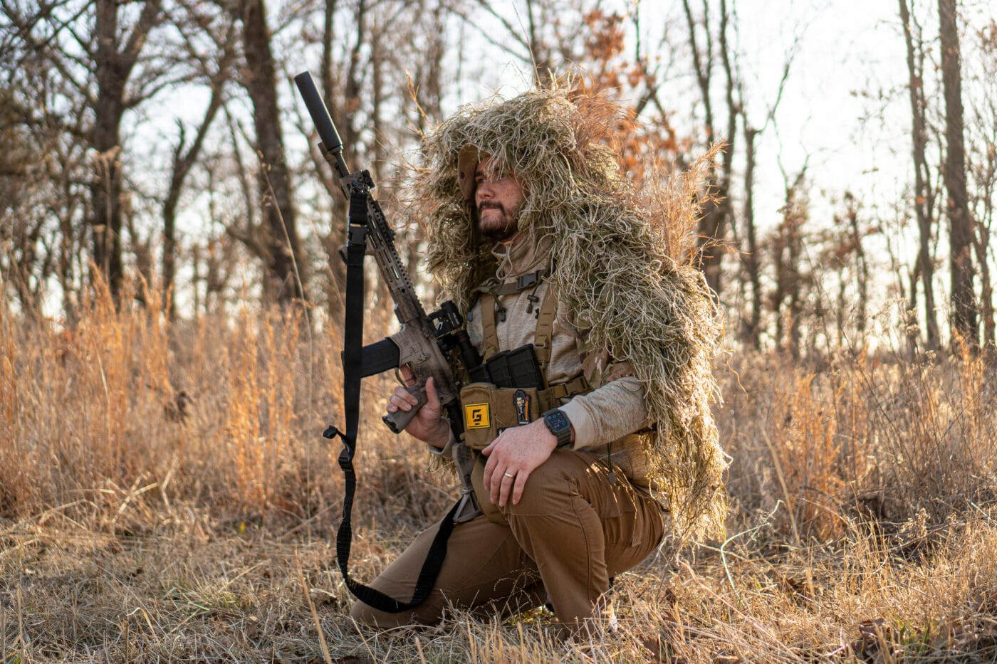 Man hunting with a DIY ghillie suit