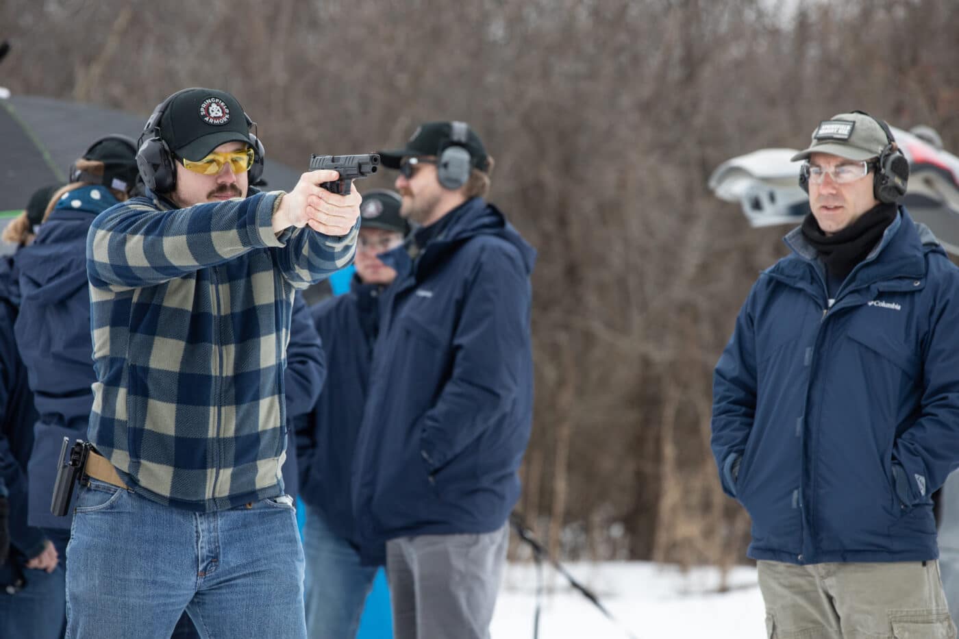 Hillsdale College shooting team practicing action shooting