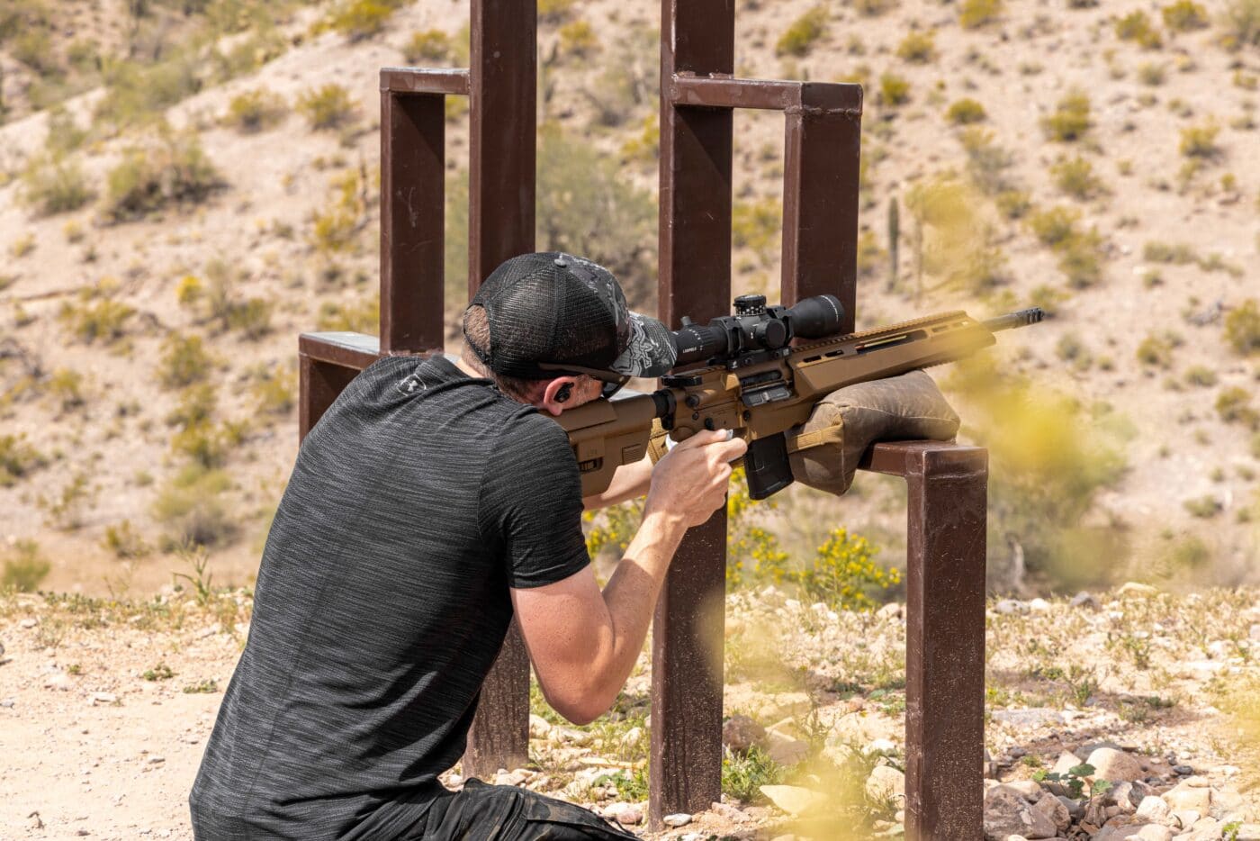 Man shooting a Springfield Armory SAINT Edge ATC during rifle competition