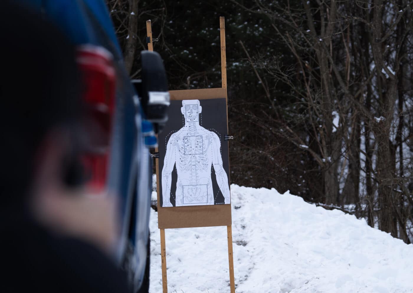 Using the full length of a vehicle for cover on the shooting range.