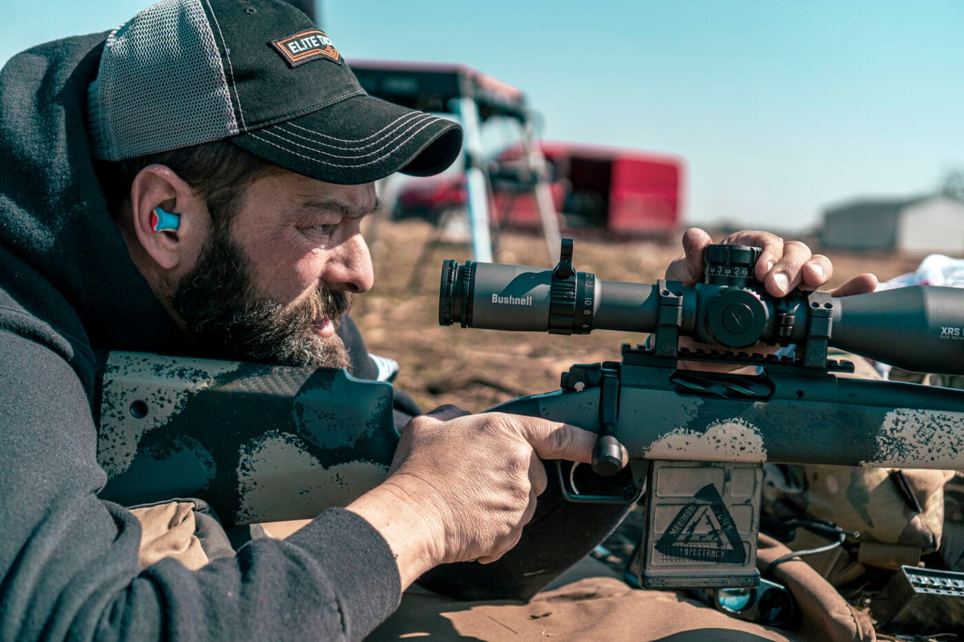 Man demonstrating how to DOPE a scope