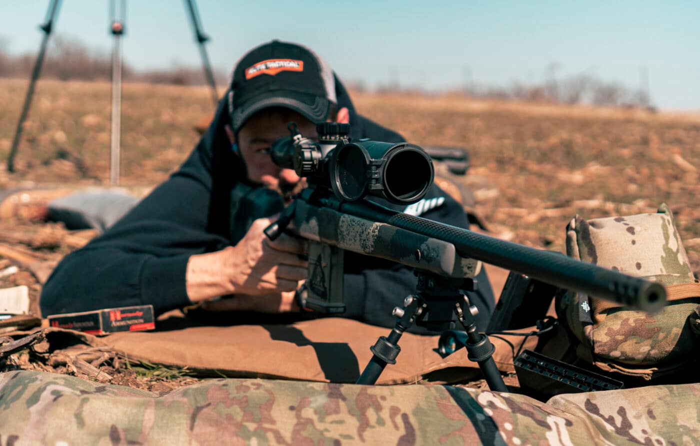 Man showing how to DOPE a rifle scope