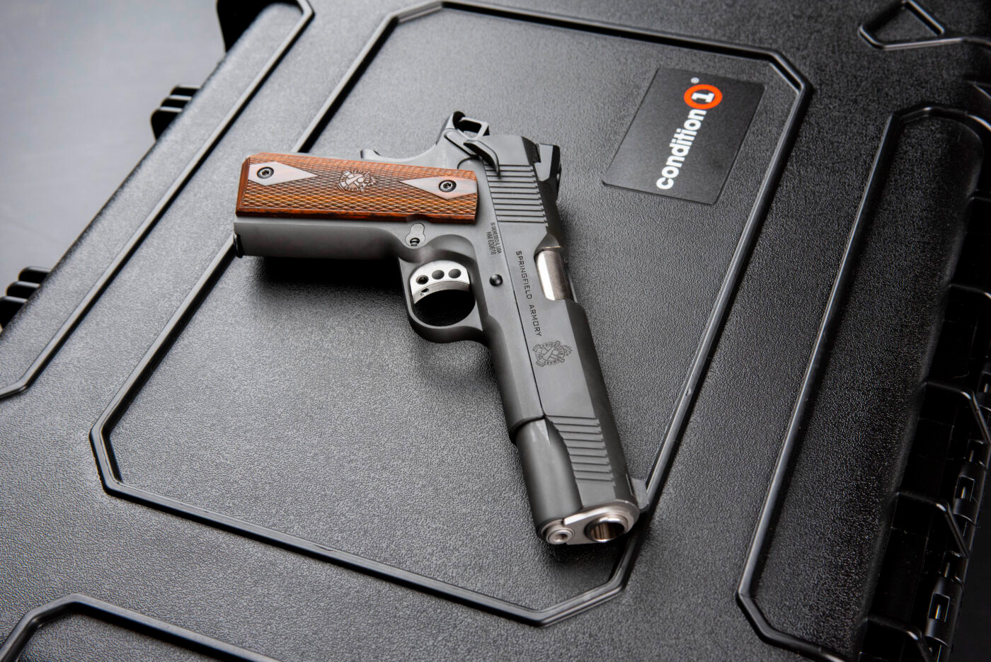Springfield Armory Garrison 1911 pistol on top of carrying case