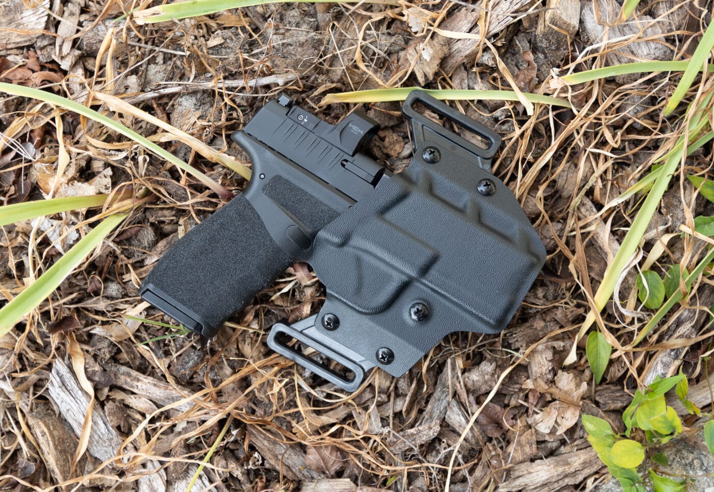 Crucial Concealment Covert OWB Holster for the Hellcat Pro with pistol holstered inside