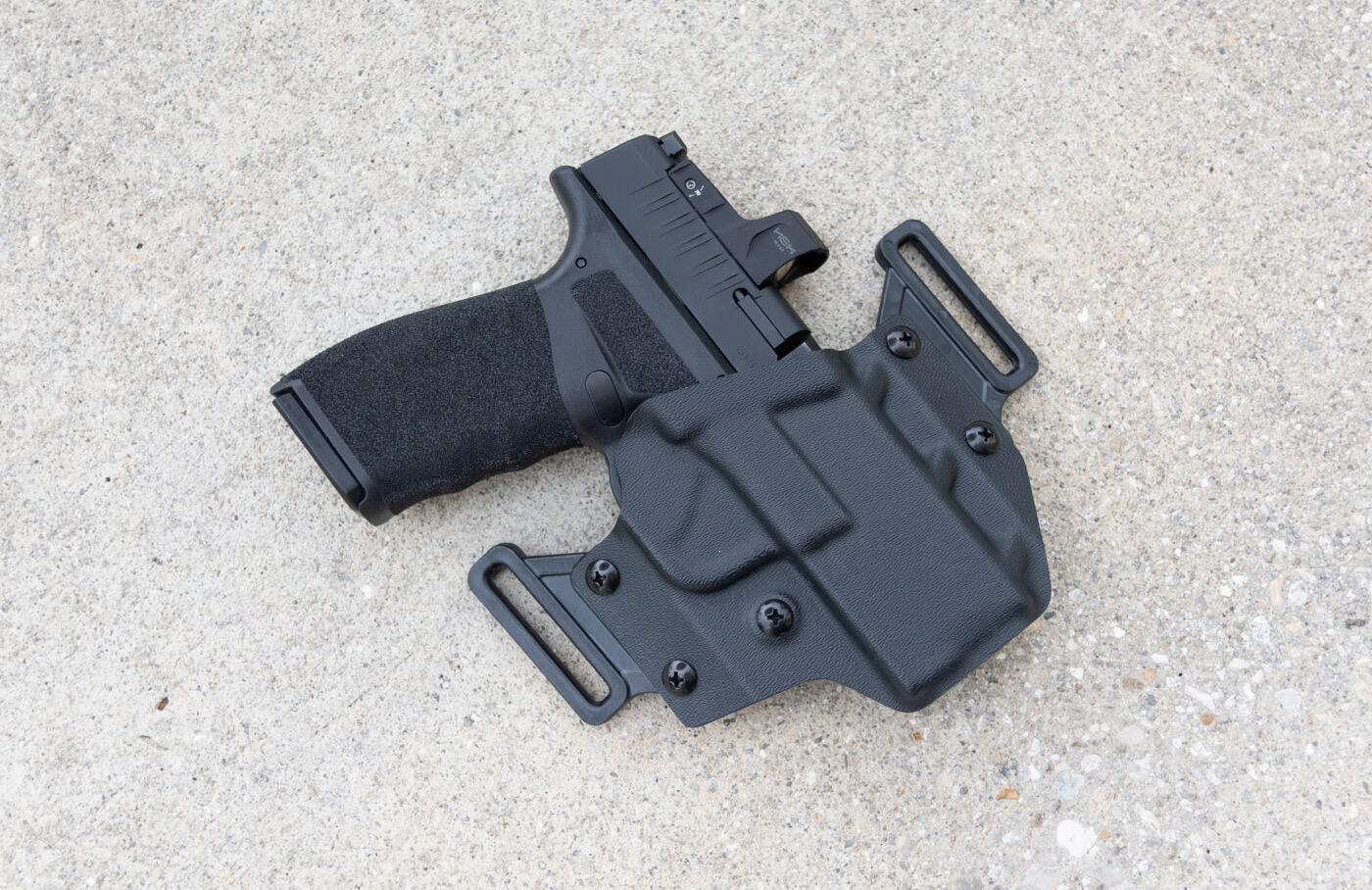 Crucial Concealment Covert OWB holster for the Hellcat Pro with pistol holstered inside