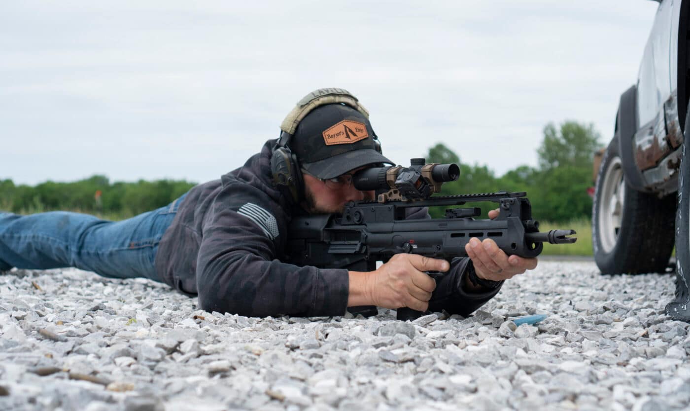 Man prone shooting Springfield Hellion rifle with Leupold scope mounted