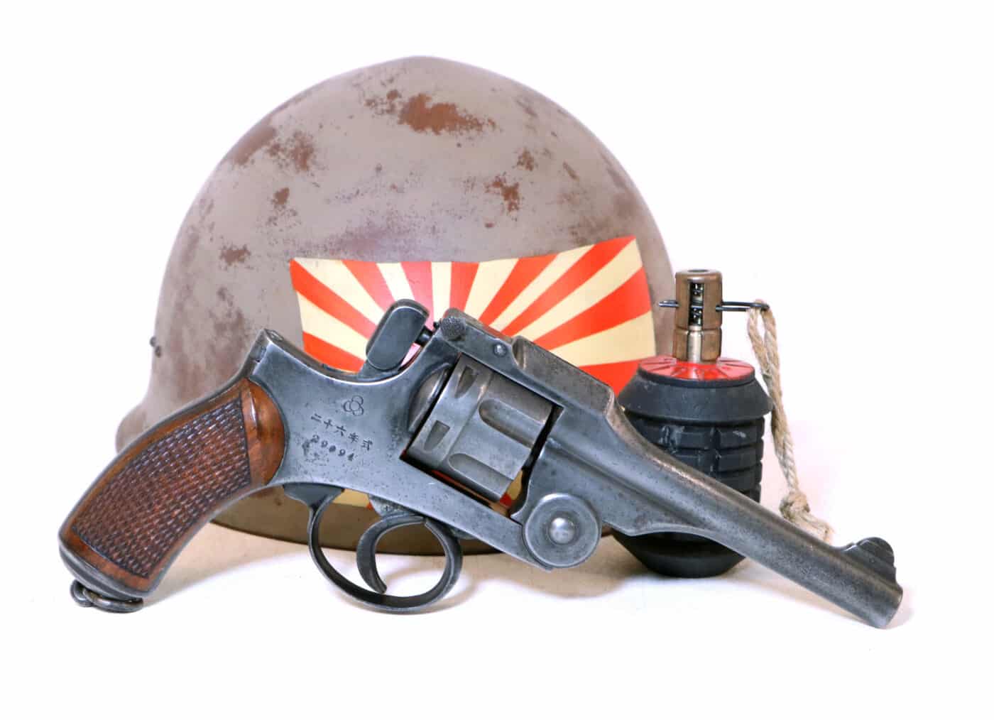 Type 26 revolver with Japanese helmet and hand grenade