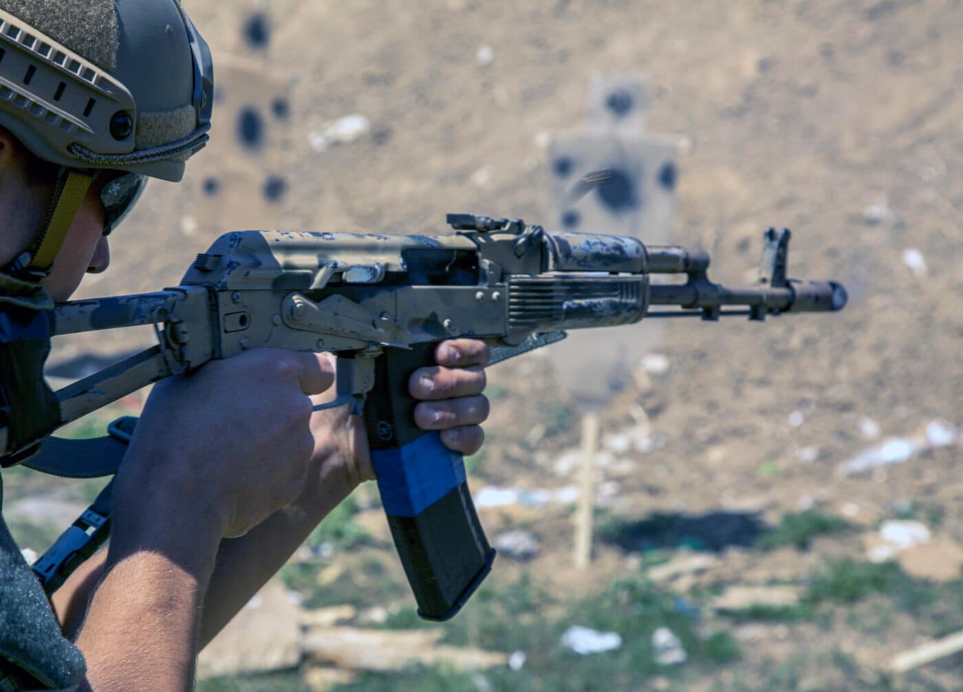 A Ukrainian SOF Operator fires and AK-74 Assault Rifle