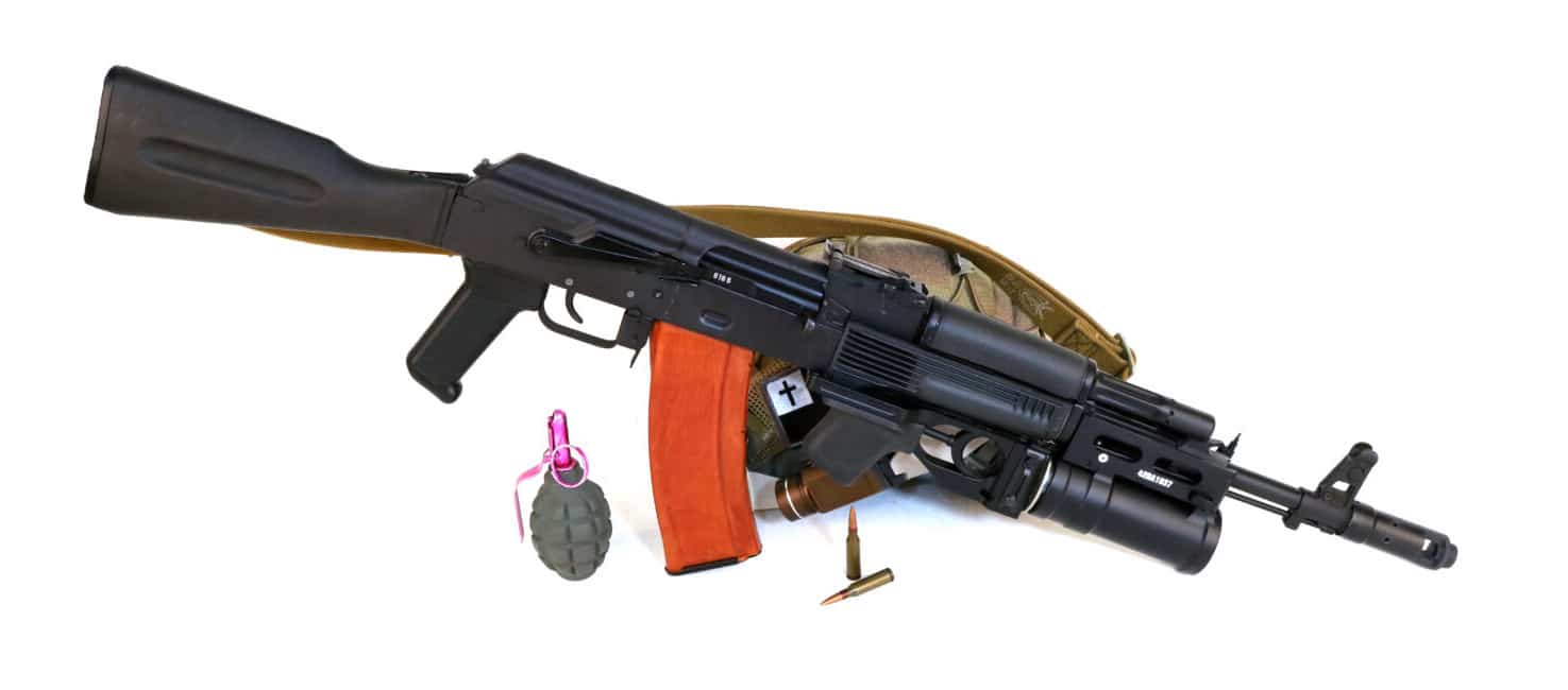 AK-74M rifle next to ammo and a grenade