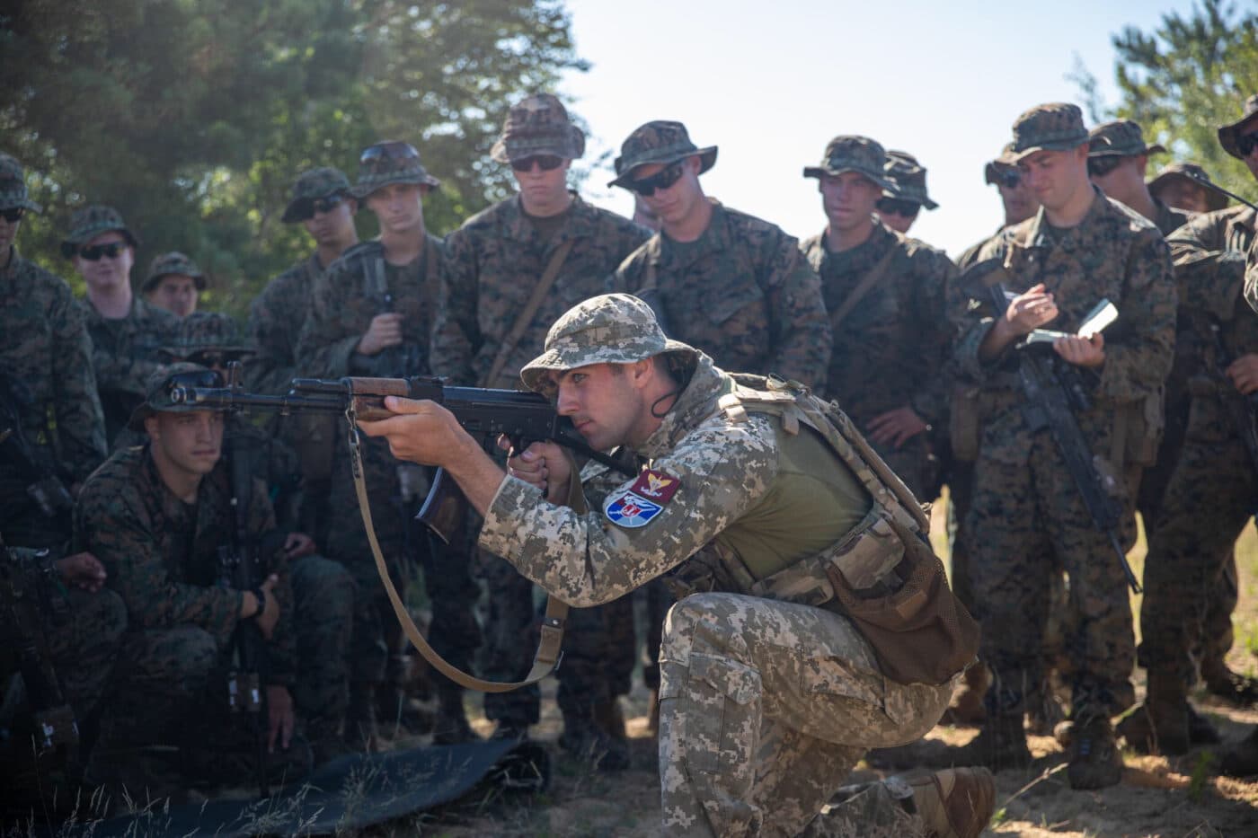 A Ukrainian soldier shows U.S. Marines rifle techniques with the AK-74 weapon system during Exercise Sea Breeze 21 on June 29, 2021