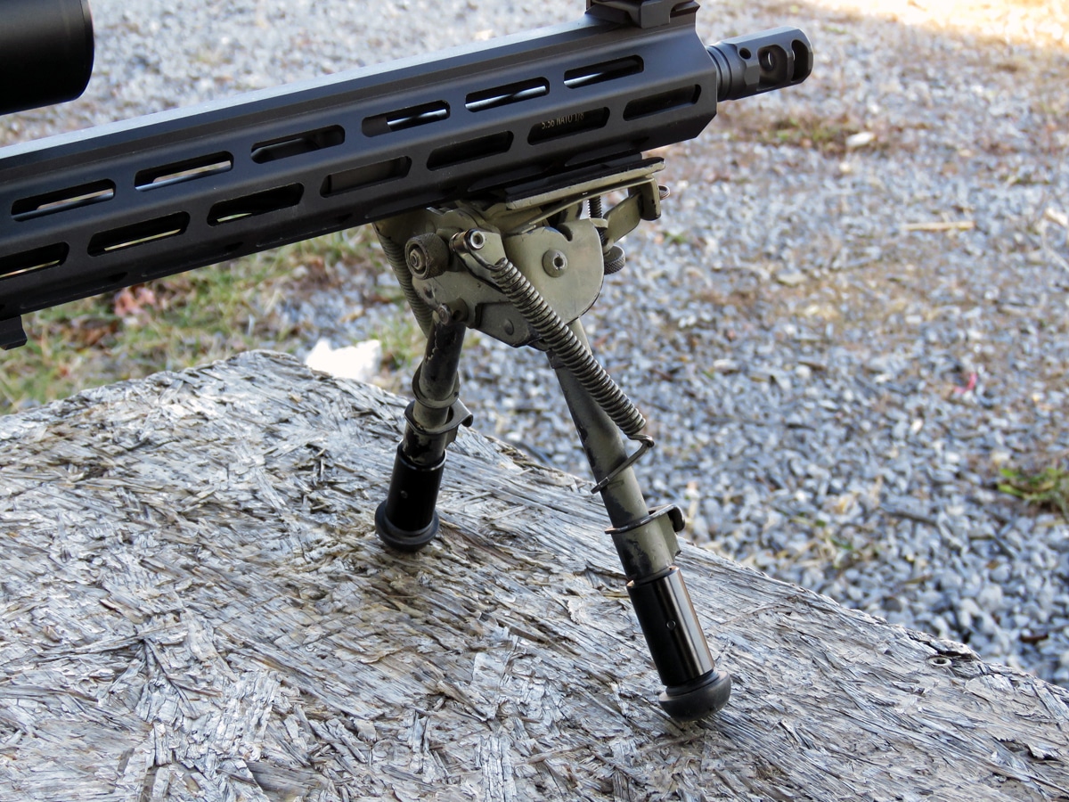 Adjustable folding bipod on SAINT AR-15 rifle