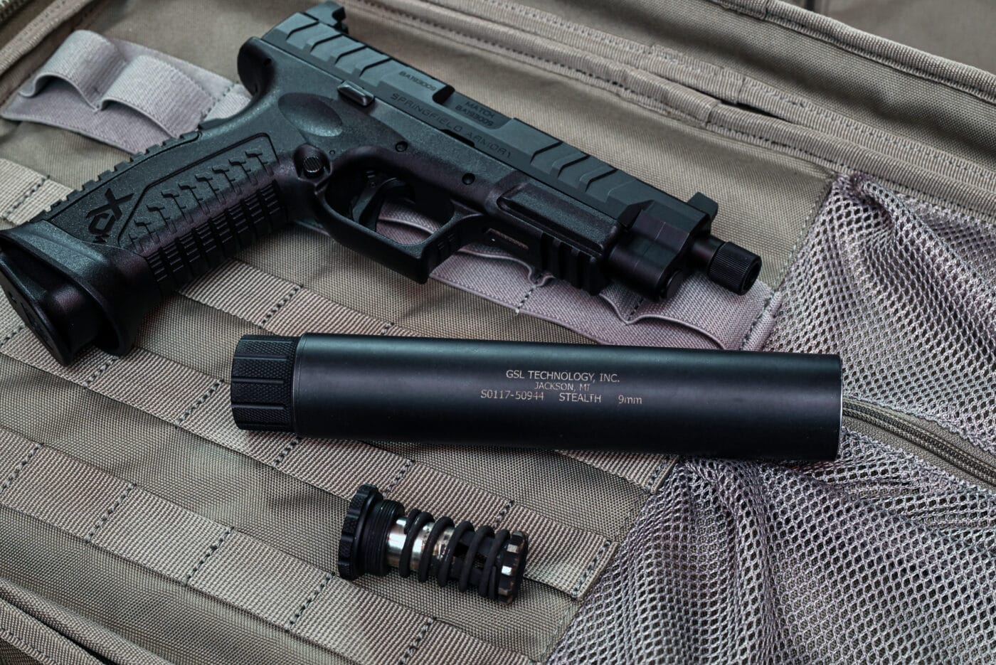 GSL noise suppressor next to Springfield XD-M Elite pistol