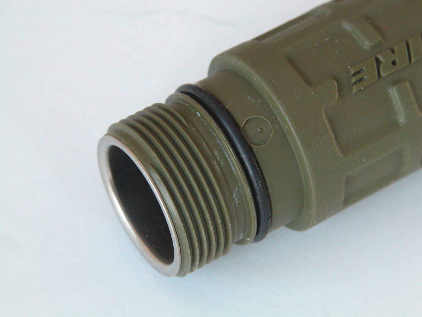 waterproofing the battery compartment of a flashlight