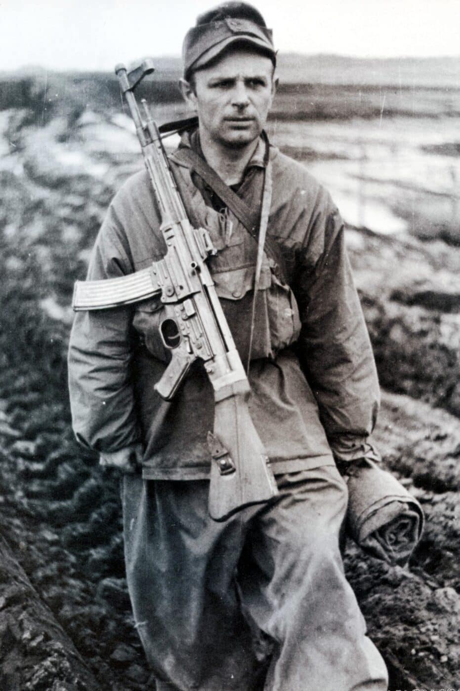 German soldier with StG44 marching
