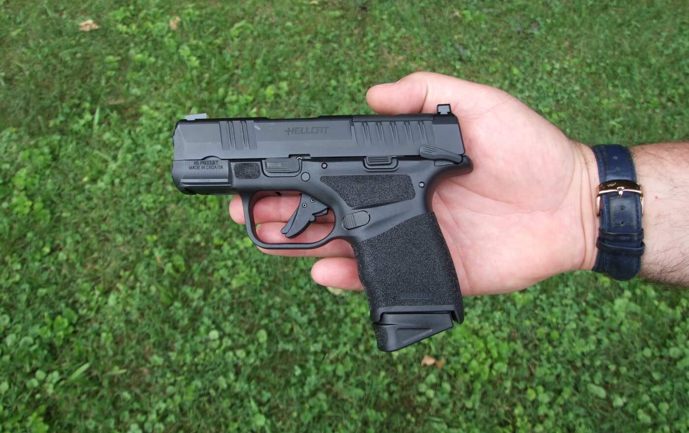 Hellcat pistol with manual thumb safety