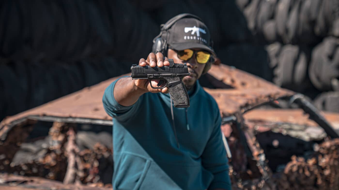 colion noir holding springfield hellcat pro pistol