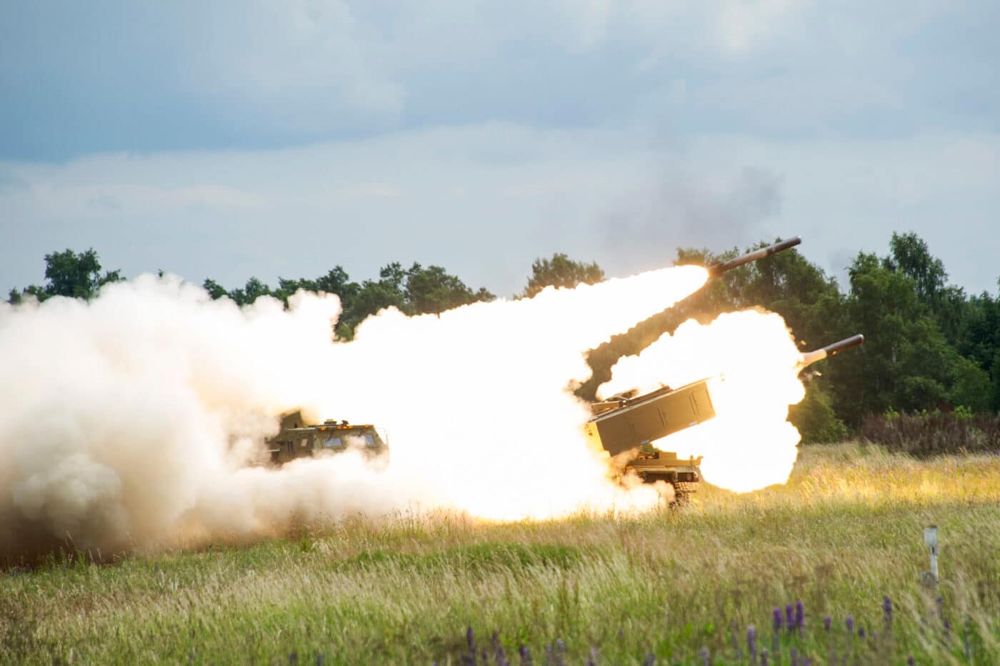 pair of himars launching