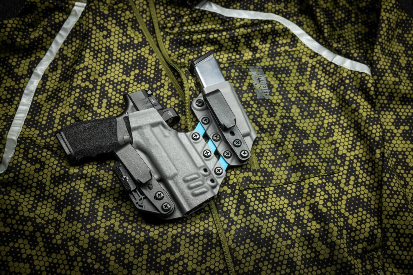 black arch holster on camo background