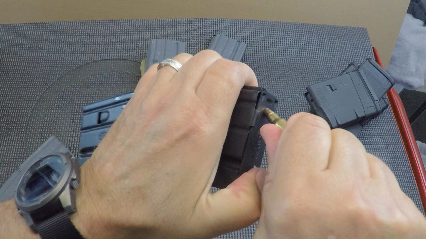 using bullet to disassemble ar-15 magazine