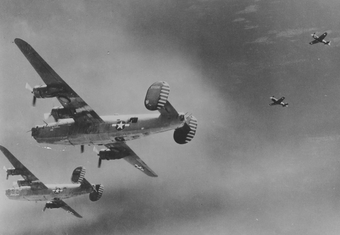 b-24 liberators esorted by curtiss p-40 fighters