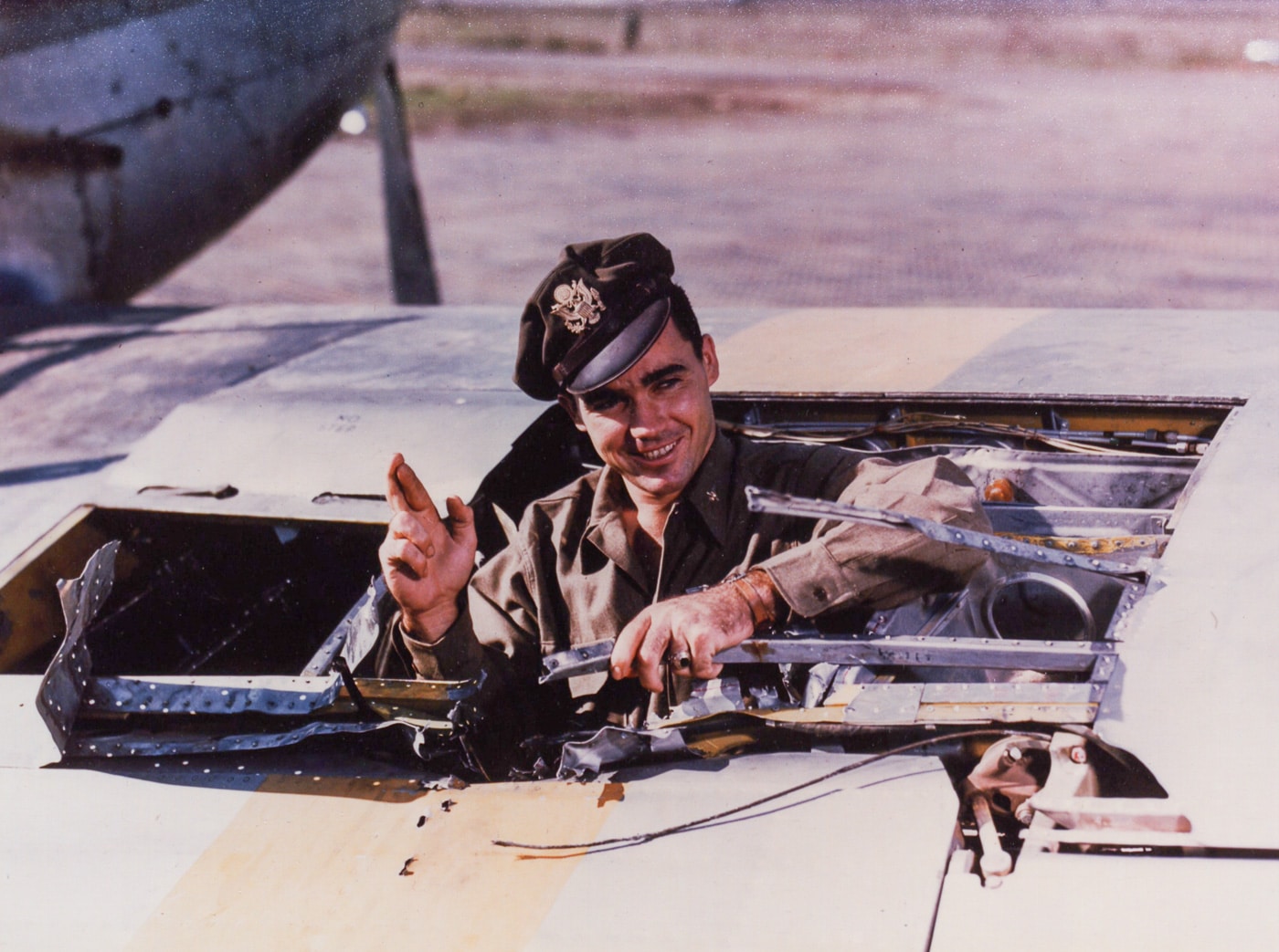 james fisk examines damage to his p-51