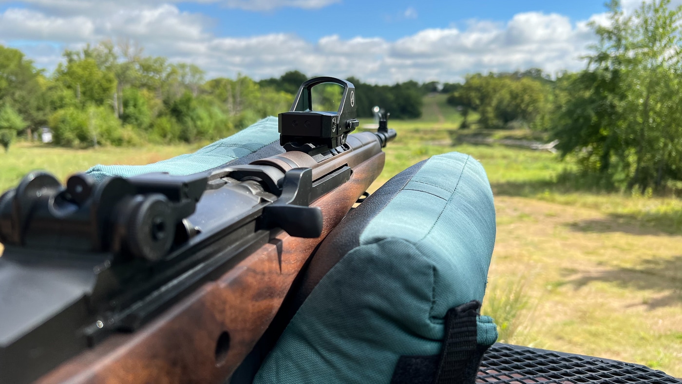 m1a in rest shooting with red dot sight
