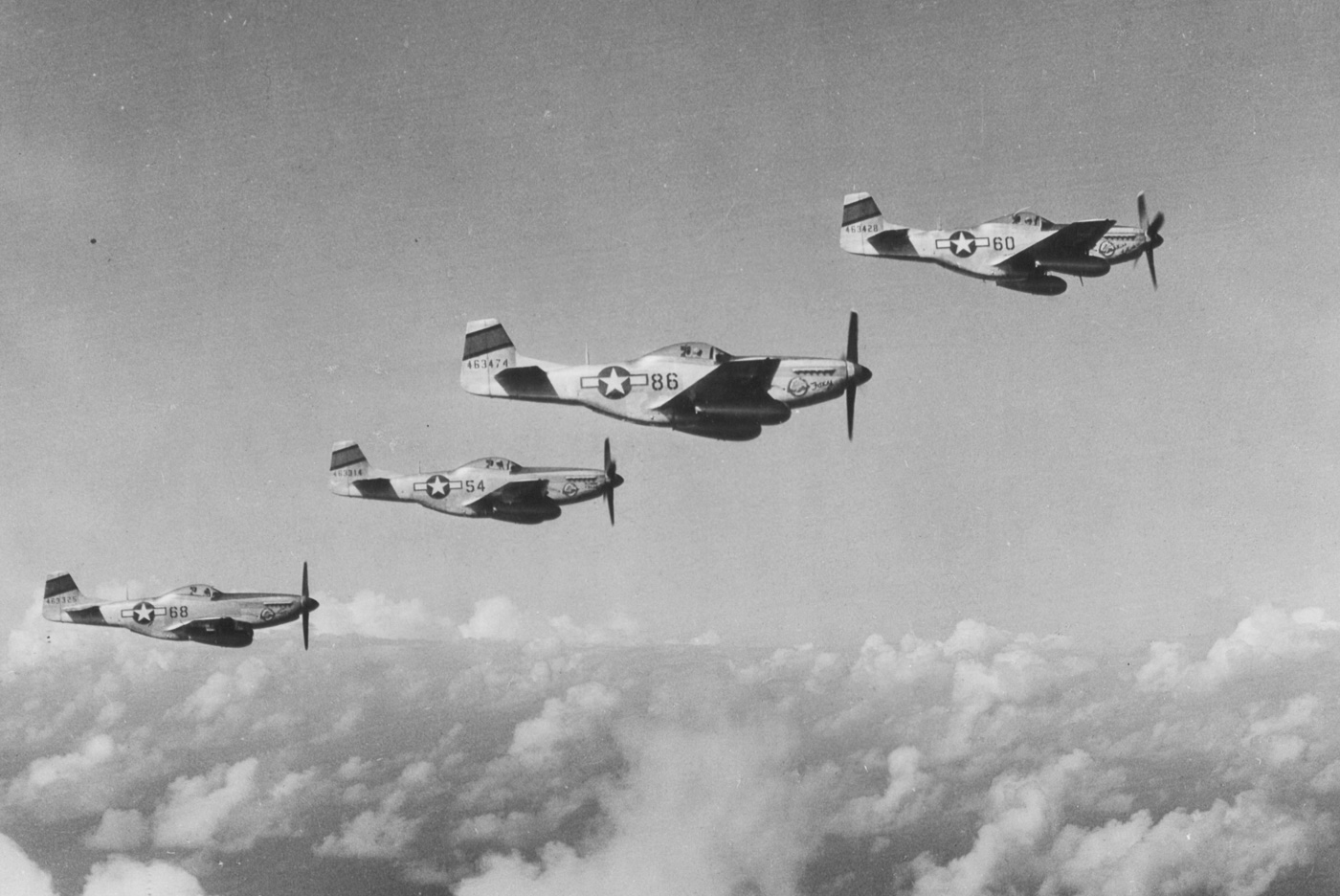 p-51 mustangs escorting b-29 bombers over iwo jima