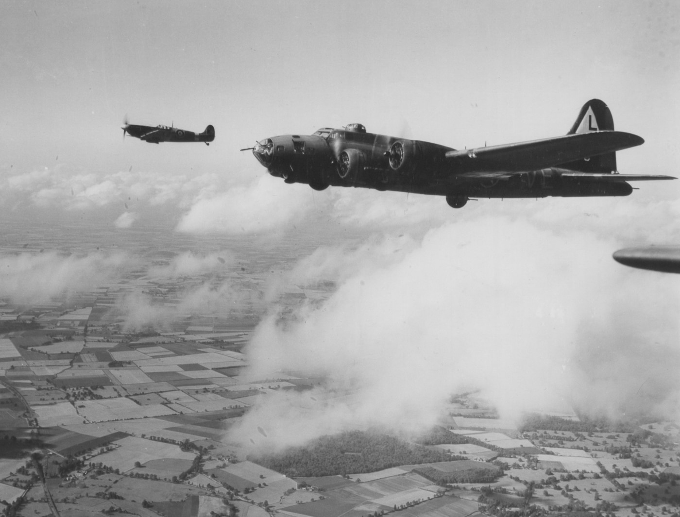 spitfire escorting b-17 bomber over germany