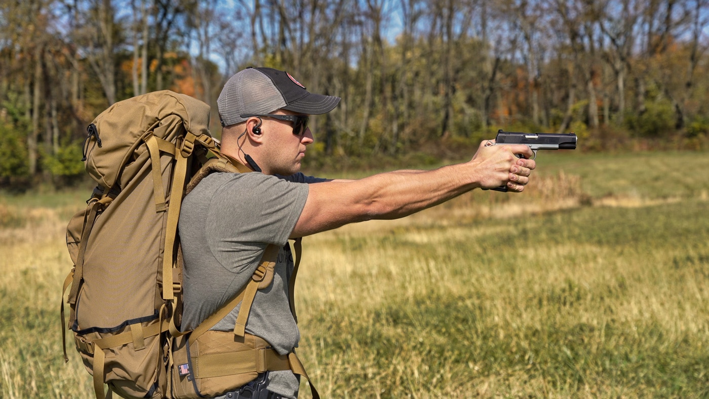 shooting a bear with a pistol