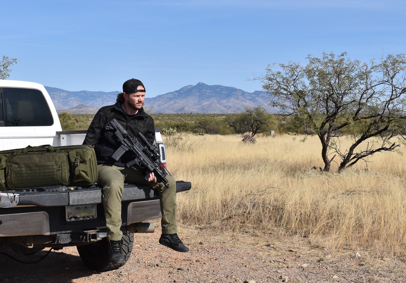 sitting with hellion bullpup rifle