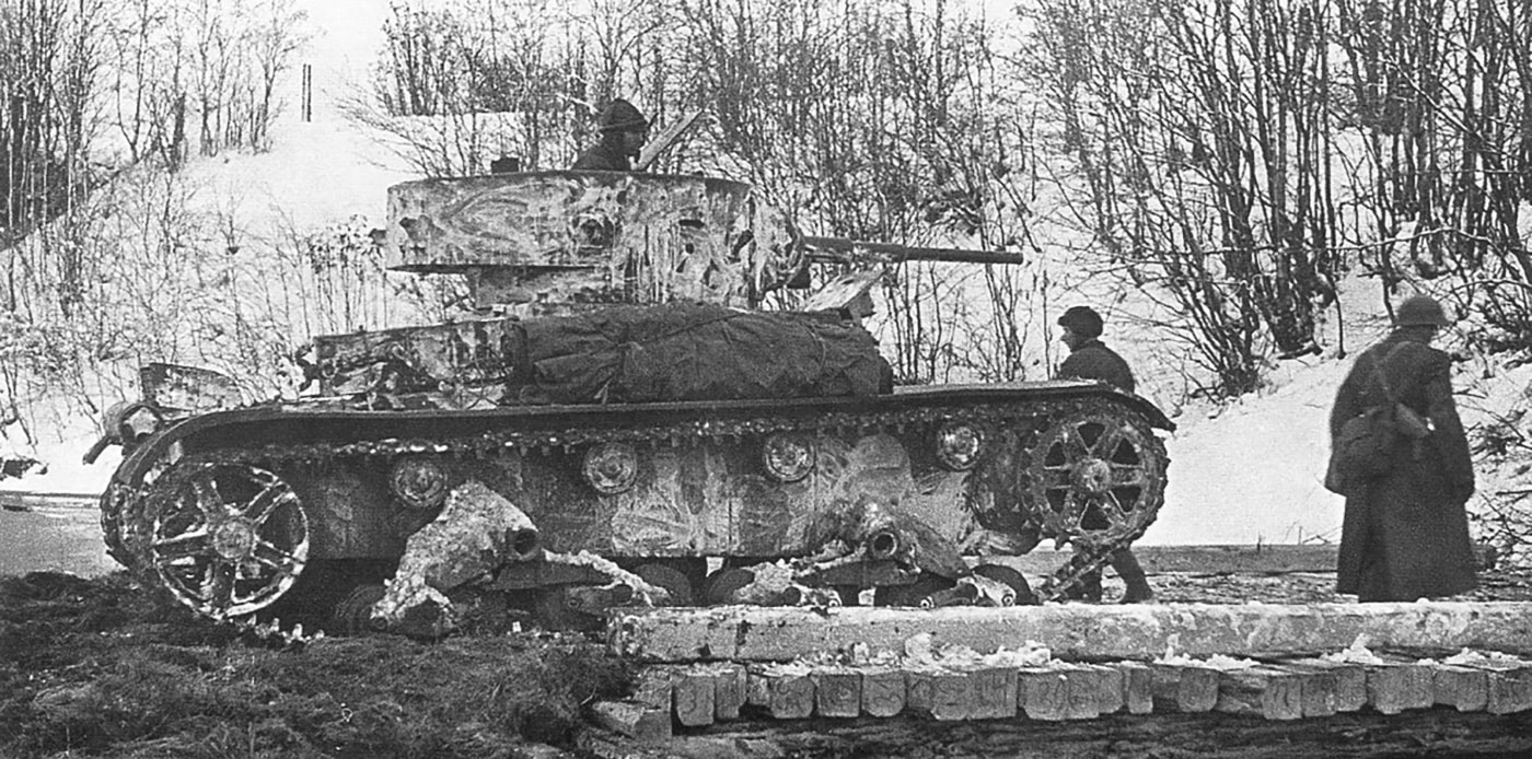 t-26 crosses bridge during invasion of finland