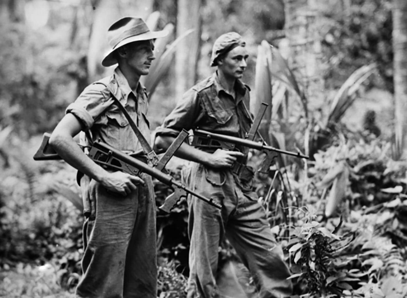 australian soldiers armed with own guns