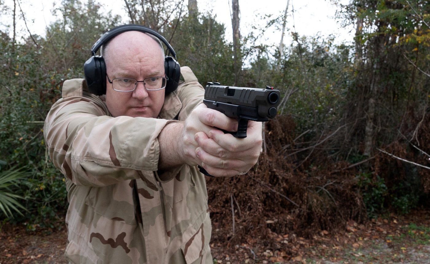 author testing the od green 10mm xd-m elite with nosler 10mm ammo