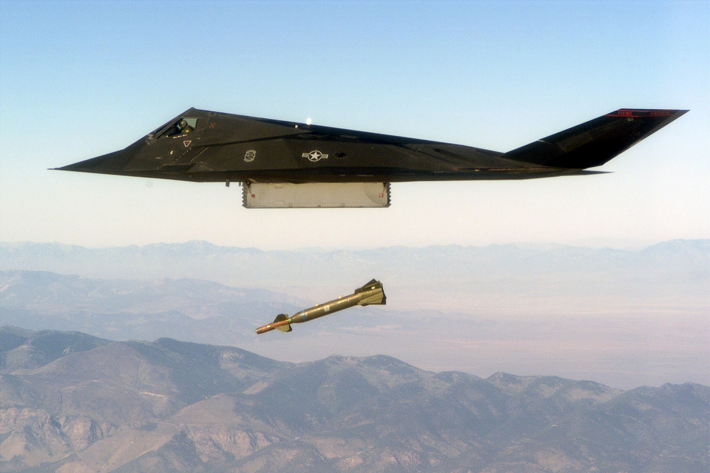 f-117 dropping a gbu-28 laser guided bomb
