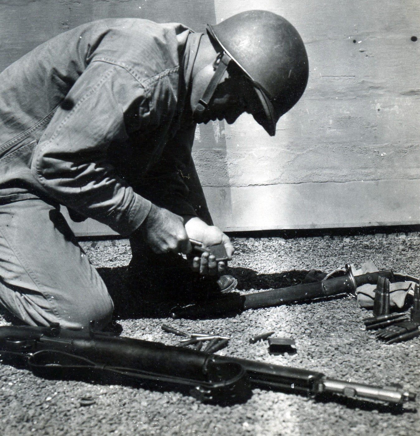 loading cartridges into the en-bloc clip for the m1 rifle