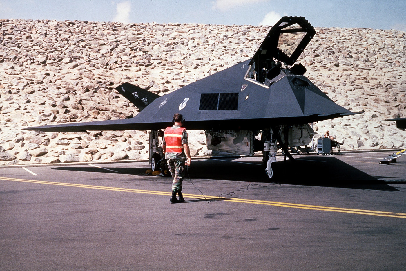 marshaling an f-117 on the flight line